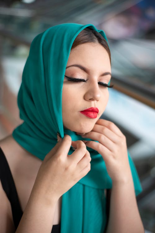 Portrait of Elegant Woman Wearing Headscarf