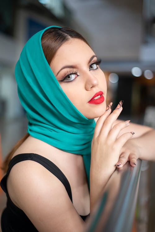 Portrait of Elegant Woman Wearing Headscarf