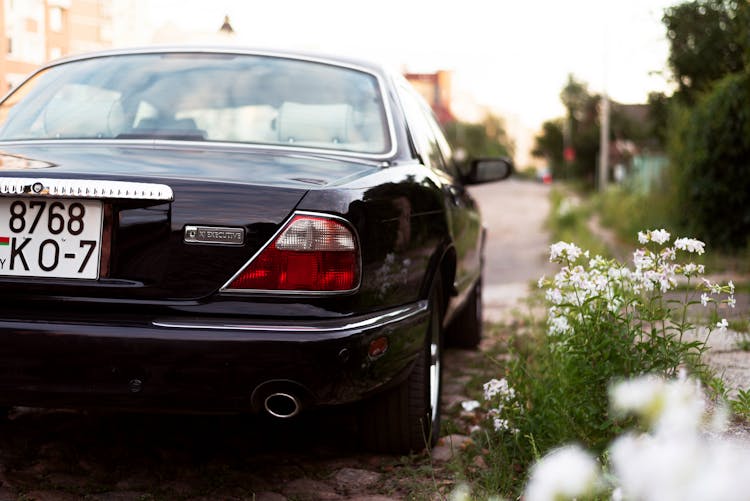 Black Car Parked On Street Side