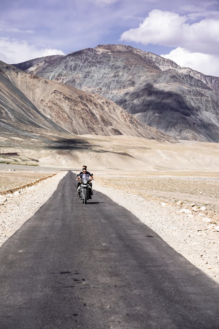 A Man Riding A Motorcycle