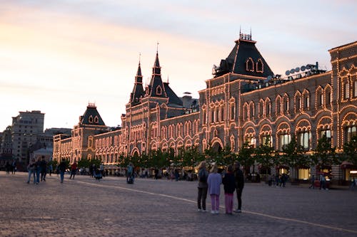 People near Illuminated GUM Shopping Mall in Moscow