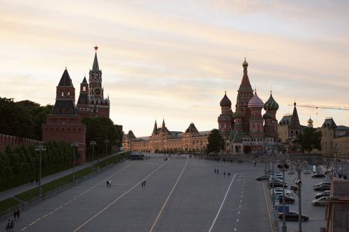 Free View of Red Square and Saint Basil's Cathedral in Moscow at sunset, a famous Russian landmark. Stock Photo