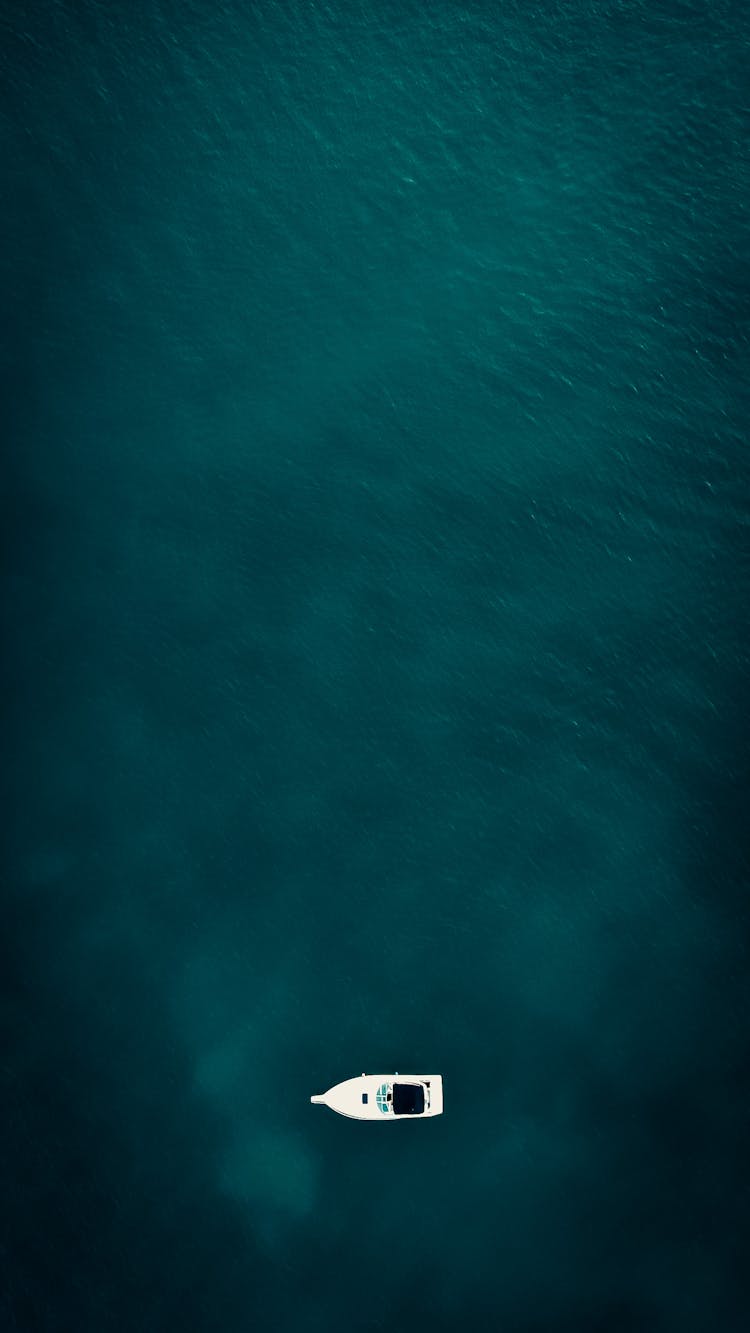 White Boat On Blue Ocean 