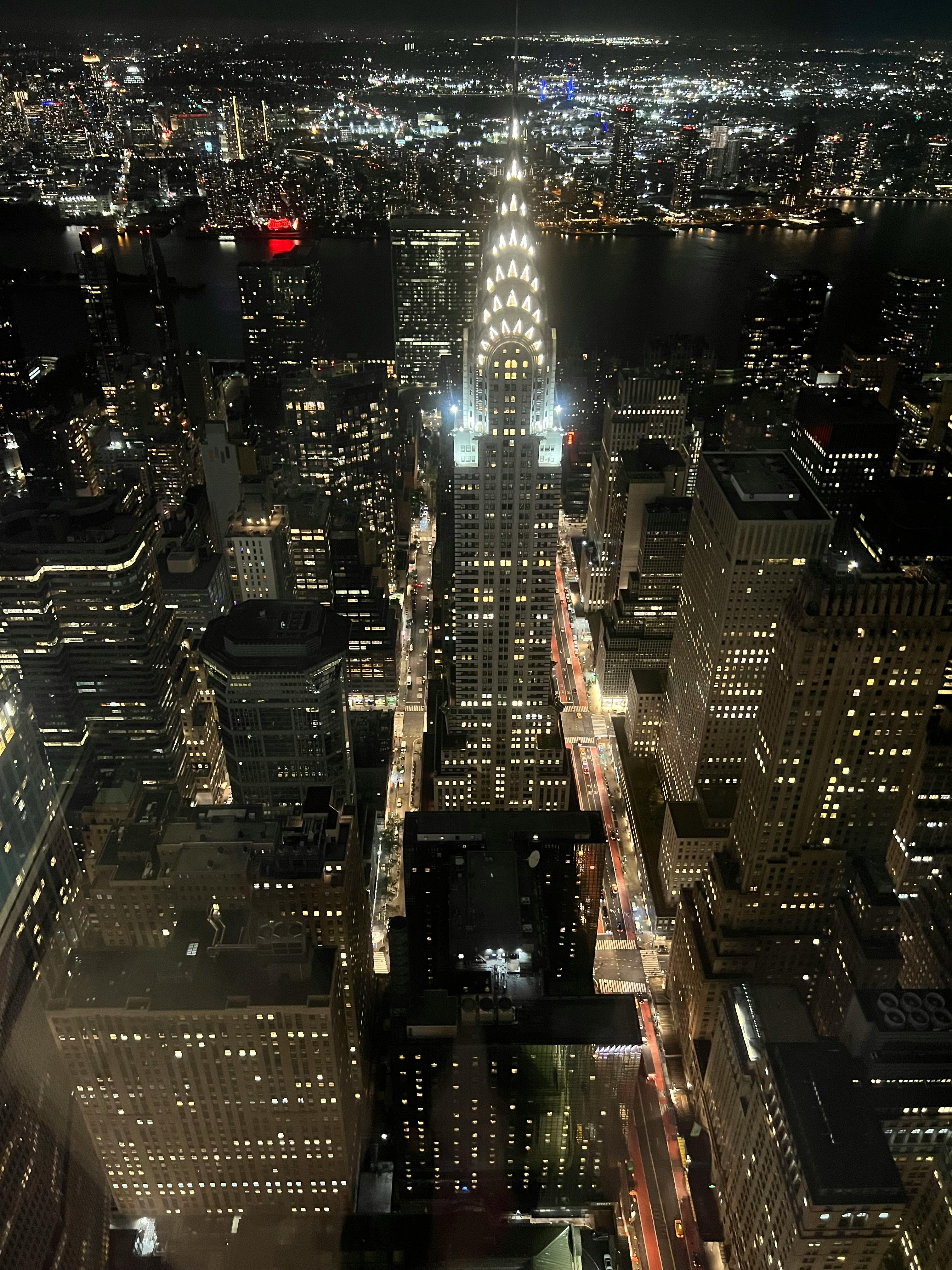 Person wearing a modern VR headset in a dimly lit room