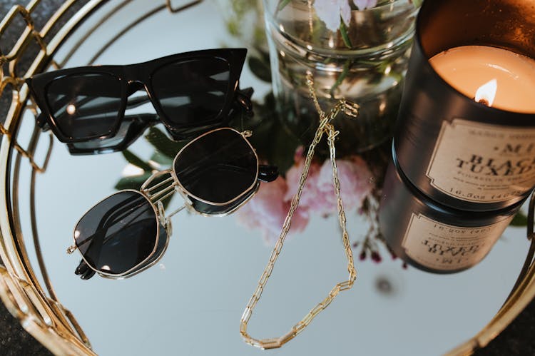 Display Of Sunglasses And Necklace