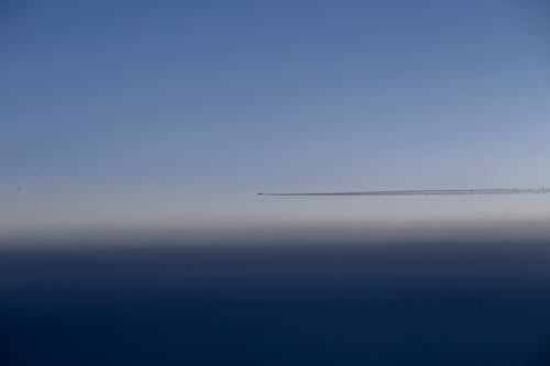 Plane Flying Through the Sky