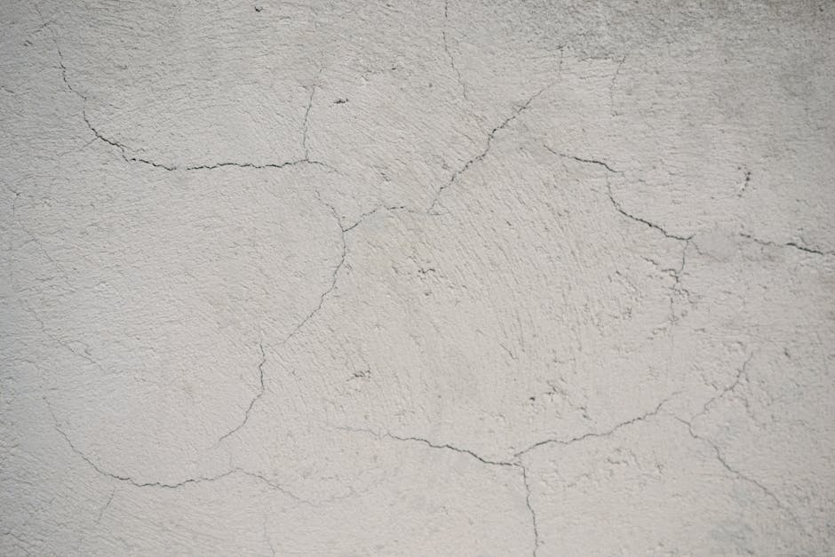 Horizontal crack in a basement wall showing signs of inward bowing - home foundation repair service Horizontal crack in a basement wall showing signs of inward bowing - home foundation repair service
