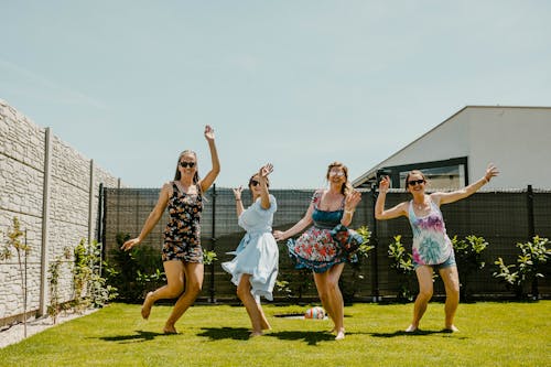 Free Women Dancing Together  Stock Photo