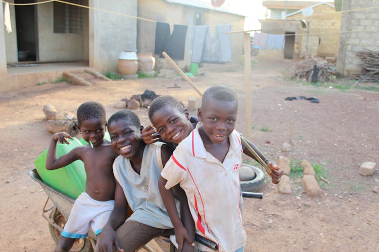 A Group Of Kids Smiling Together