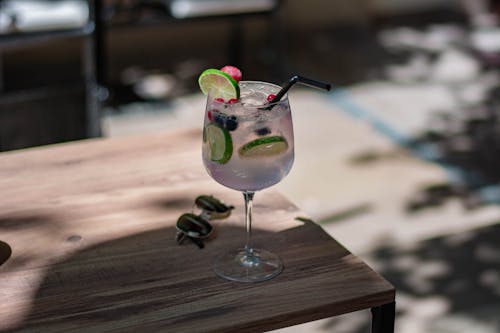 Close-Up Shot of a Cocktail Drink on Wooden Surface