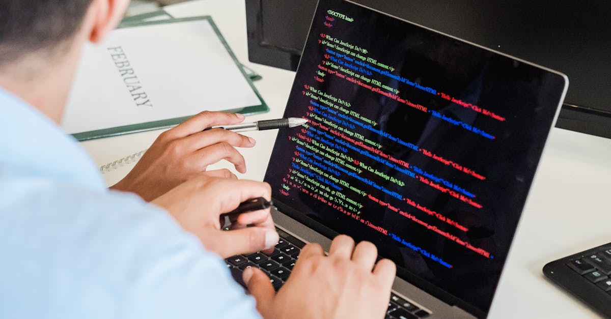 Office Worker Using a Computer in an Office · Free Stock Photo