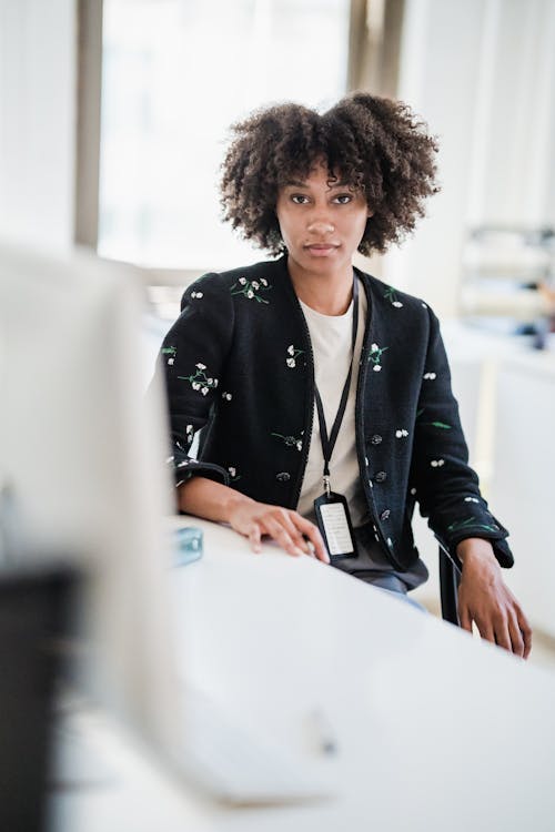 Woman Sitting at Desk