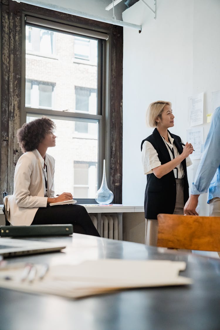 Employees Cooperating In Office