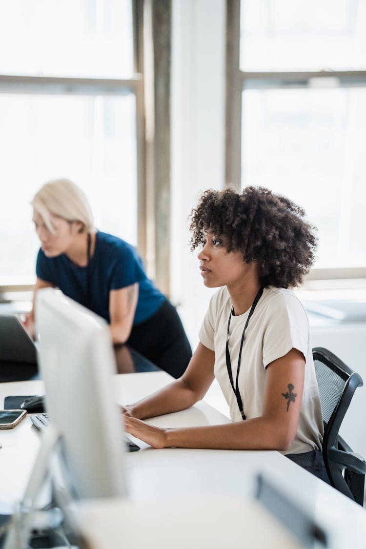 Women Focused On Office Job 