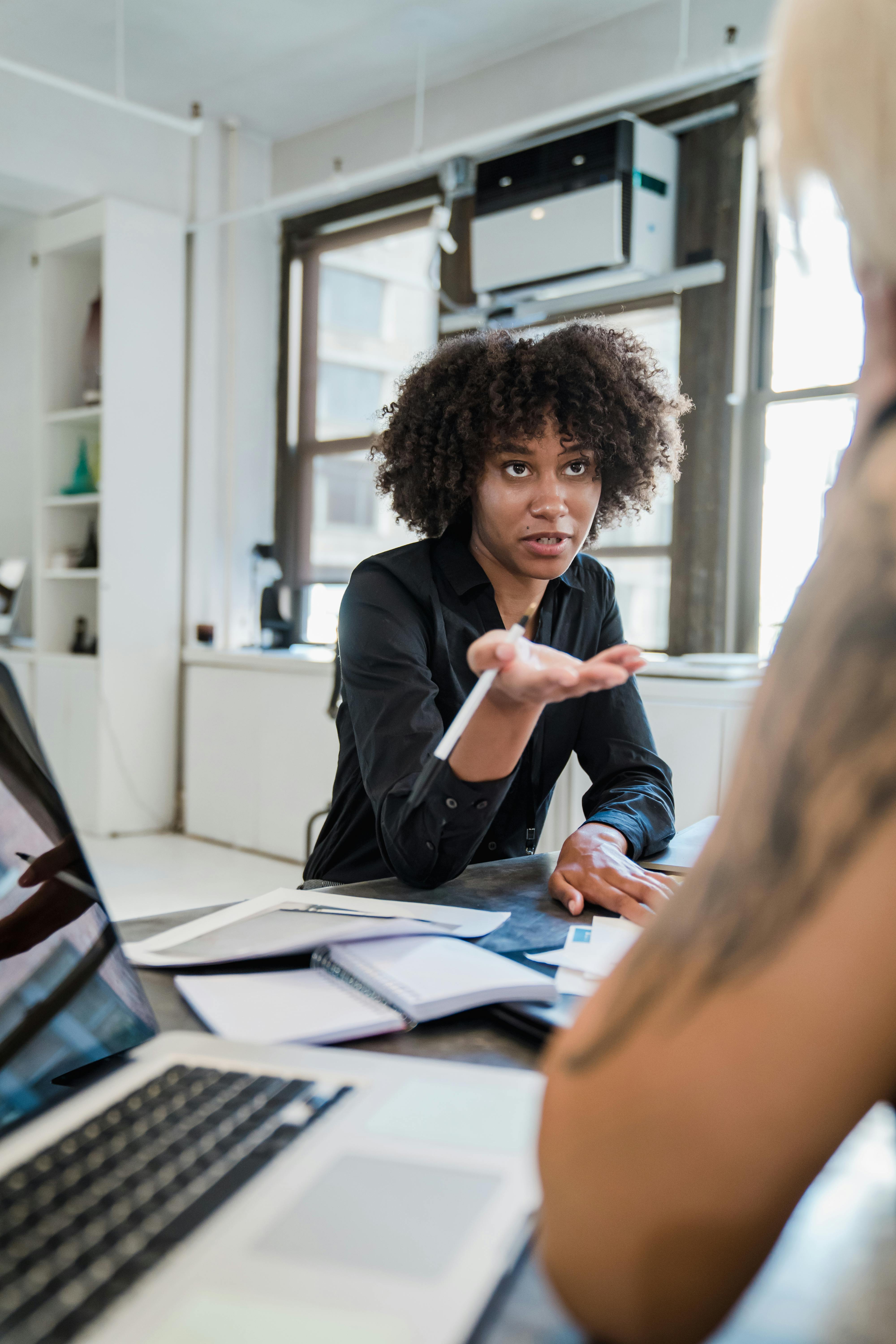 woman in office talking