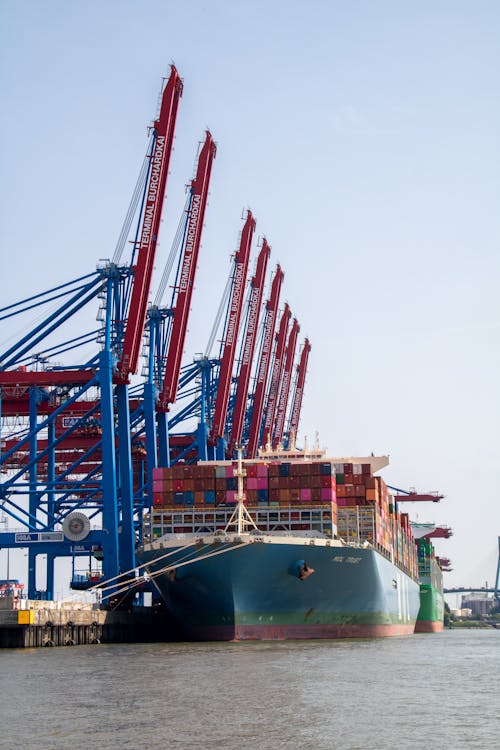 Harbor Cranes Near Shipping Container on a Container Ship