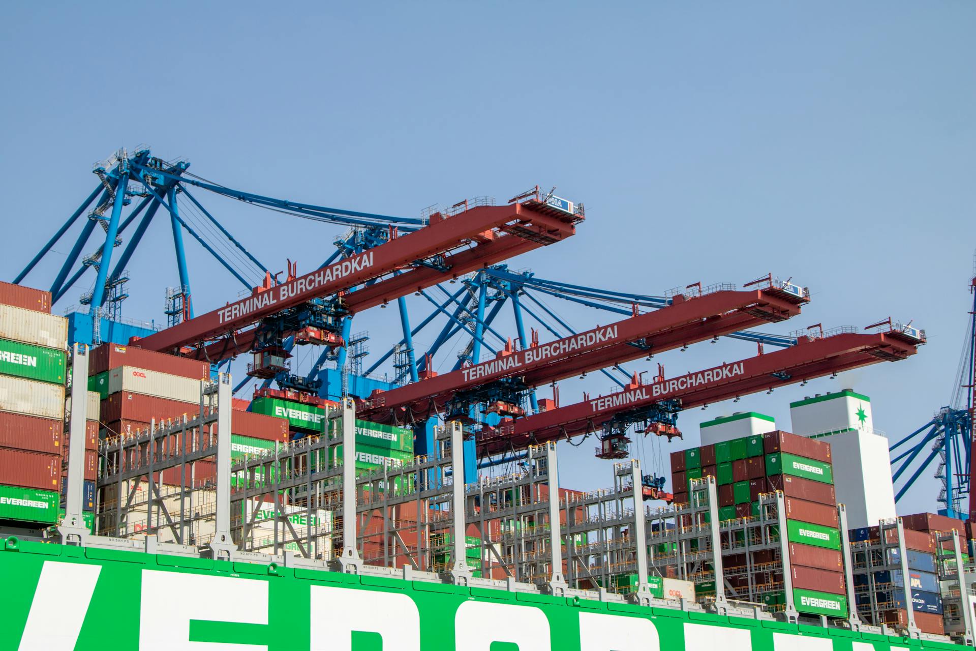 View of cargo containers and cranes at Terminal Burchardkai in Hamburg port.