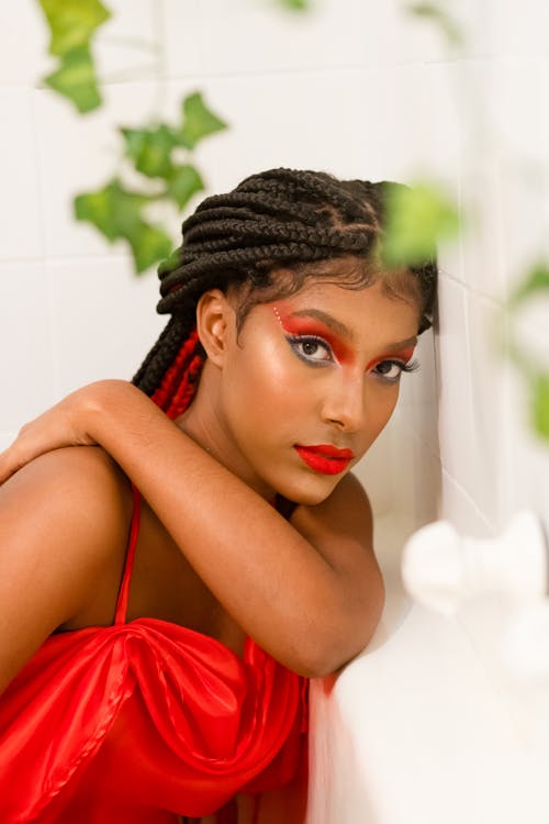 A Woman in Red Spaghetti Strap Top