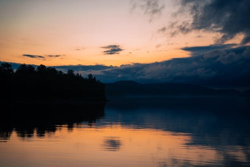Photo of Calm Lake During Dawn