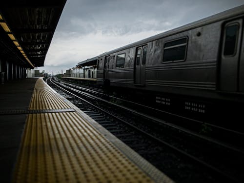 Gray Train at the Train Station