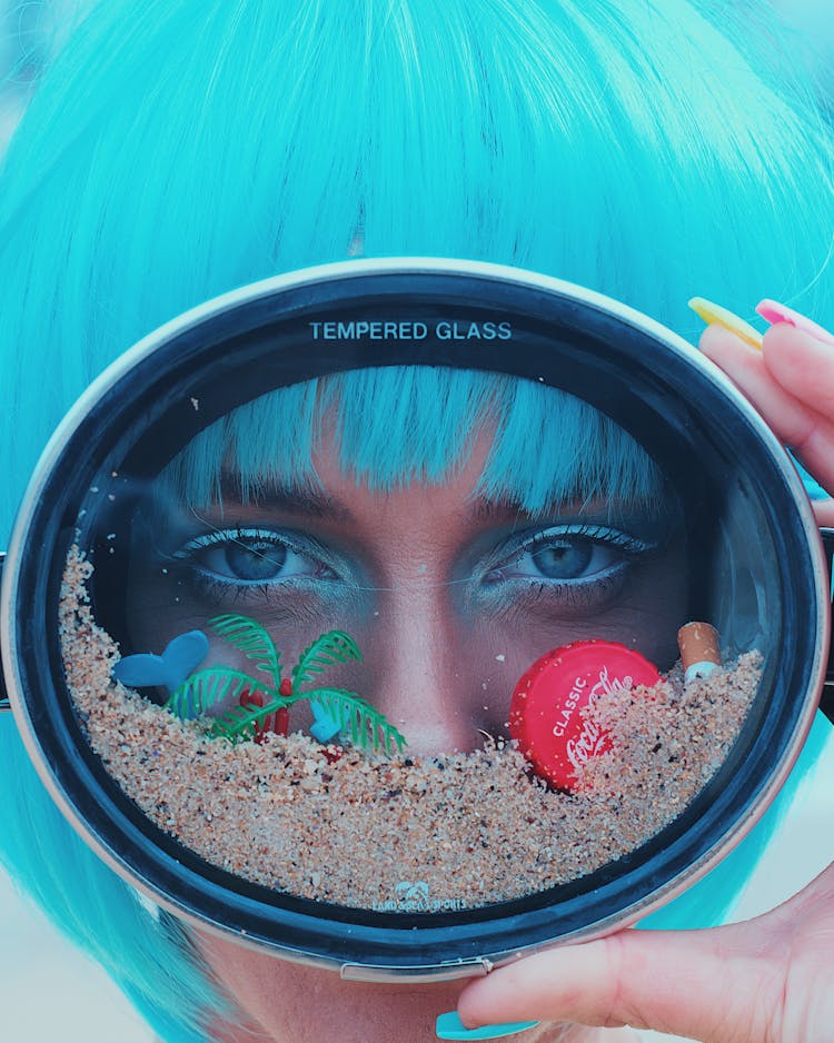 Woman Looking Through Polluted Glass