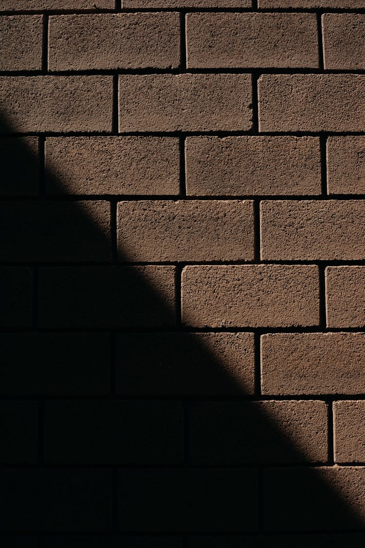 Brown Brick Wall With Shadow