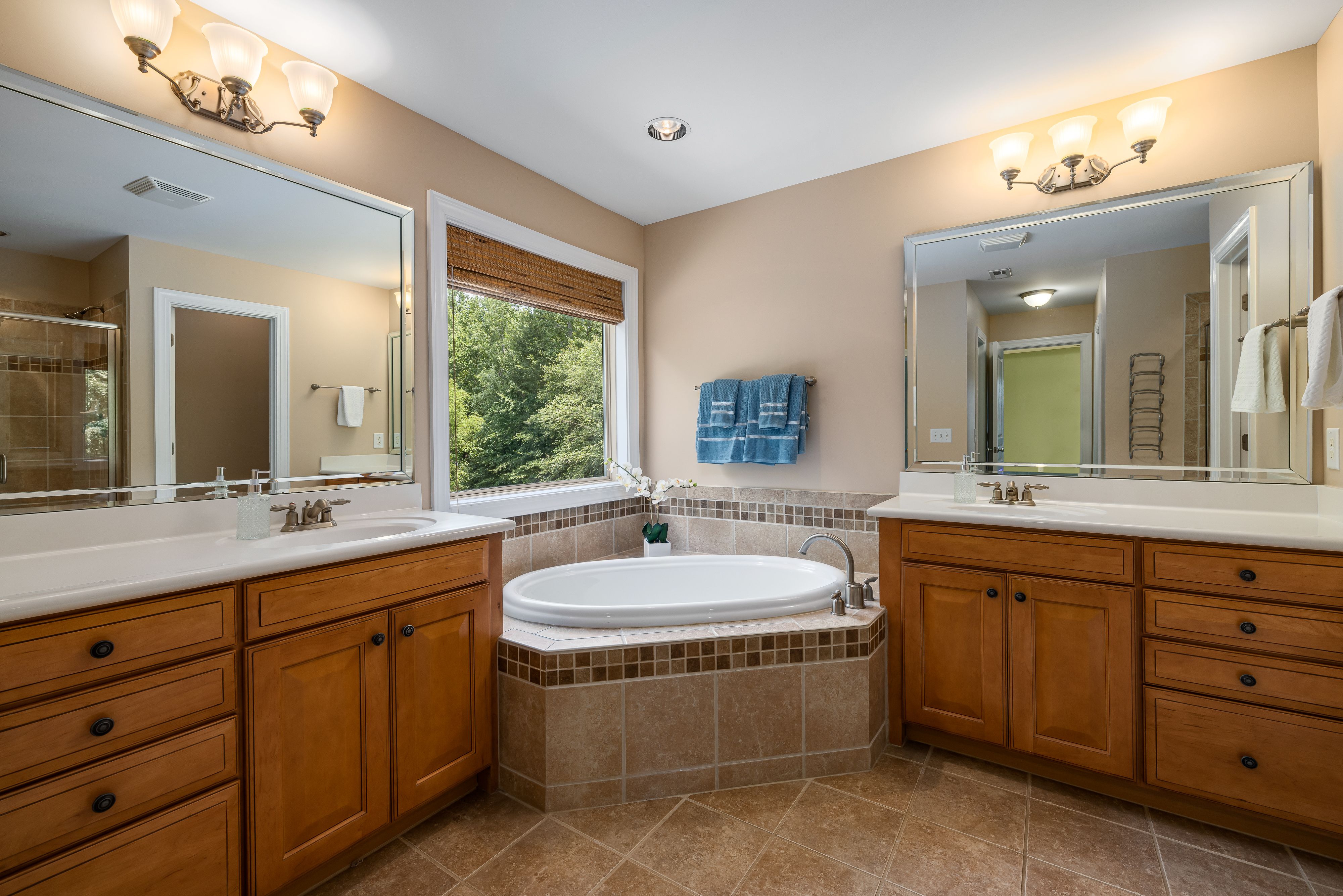 Fluted wood cabinets in a modern bathroom - bathroom renovation tampa fl
