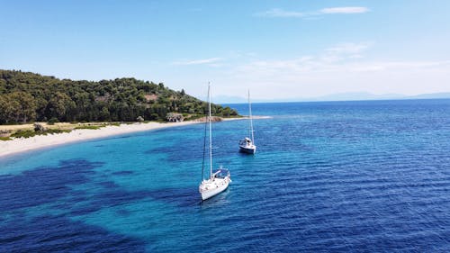Free Sailing Boat near Tsougrias beach island, Skiathos Greece Stock Photo