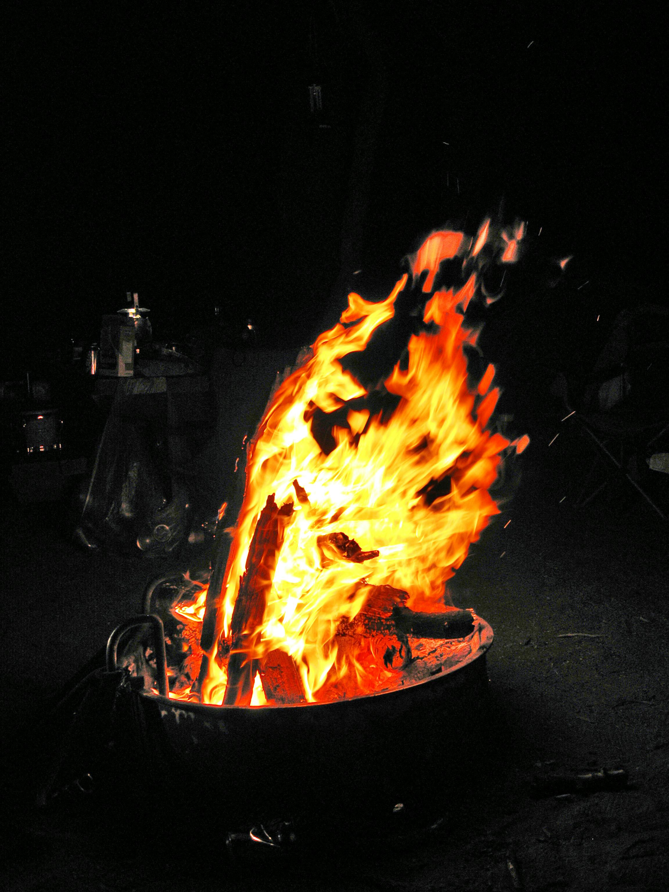 selective color photography of bonfire