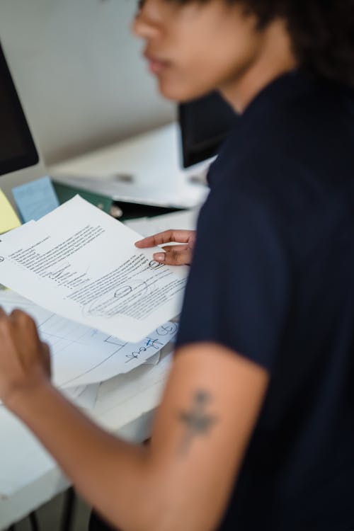 Businesswoman with Documents at an Office Desk