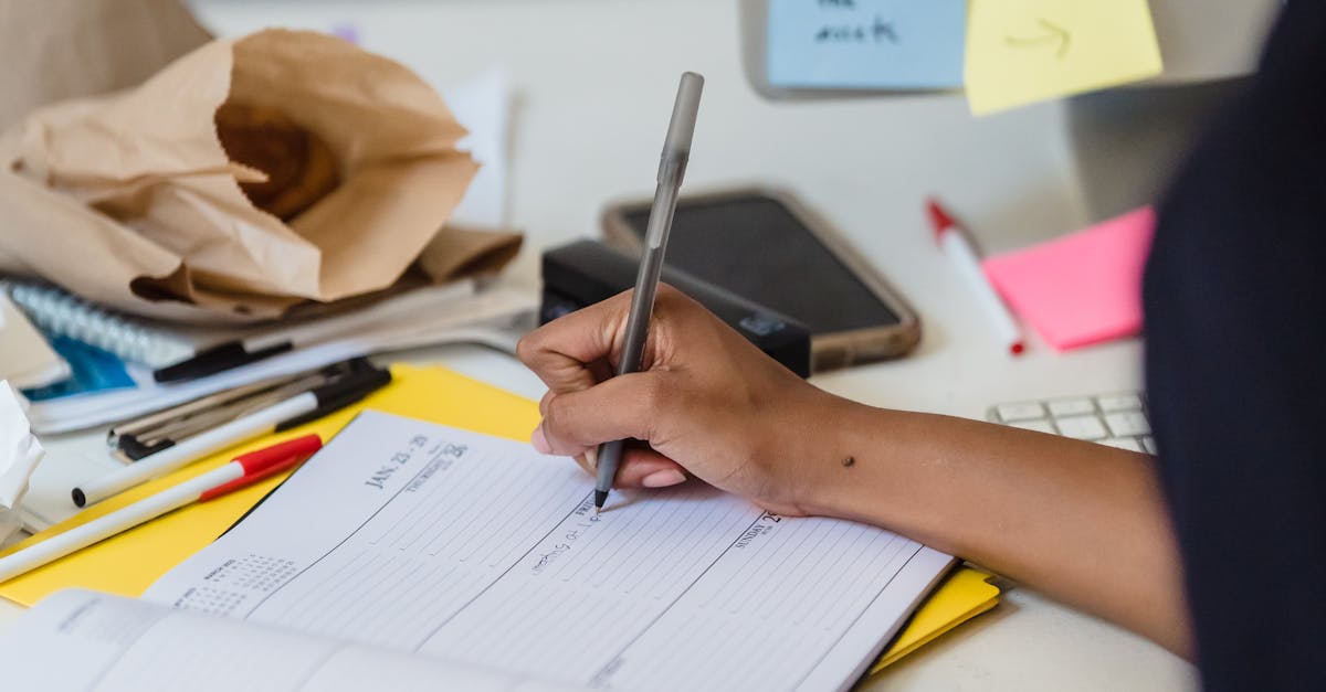 Woman Noting in Calendar · Free Stock Photo