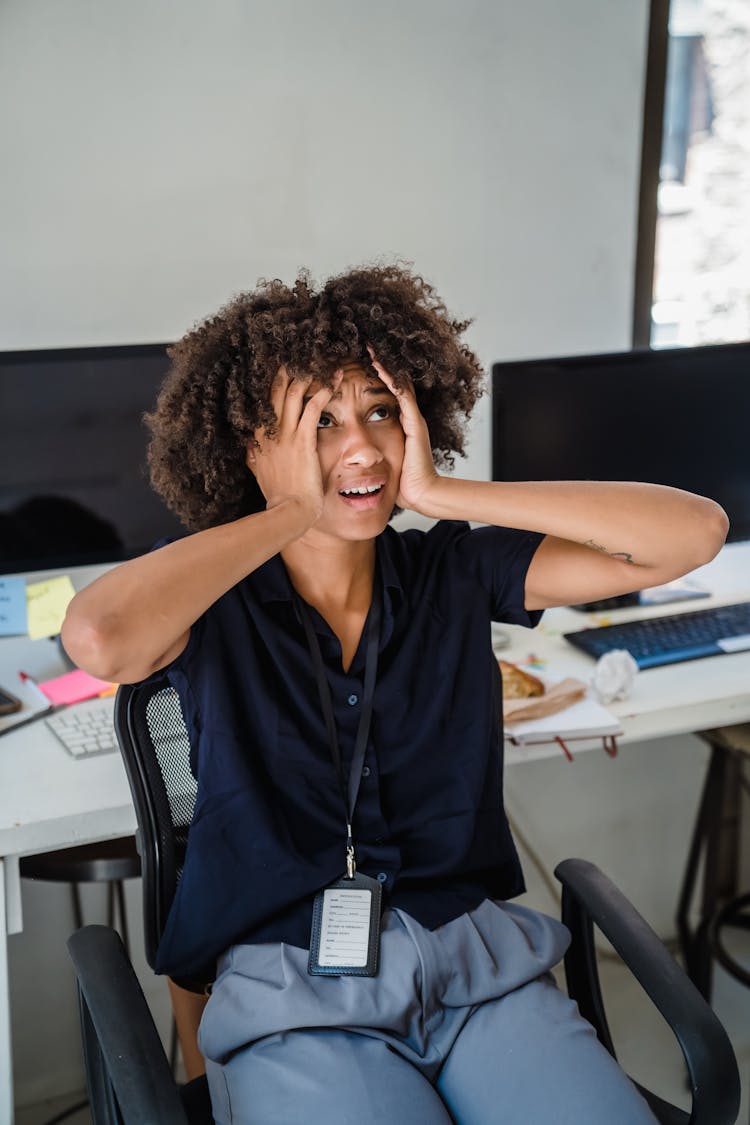 Stressed And Frustrated Businesswoman In An Office