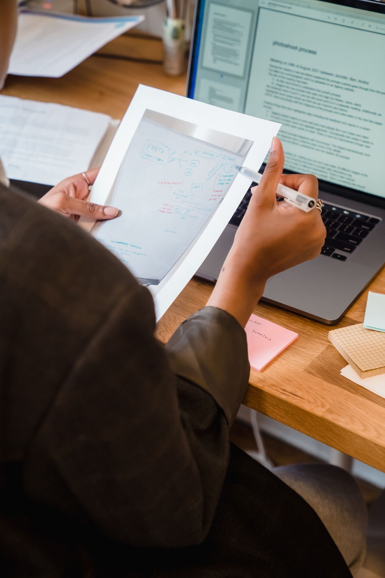 Real close-up of professional office paperwork and planning.