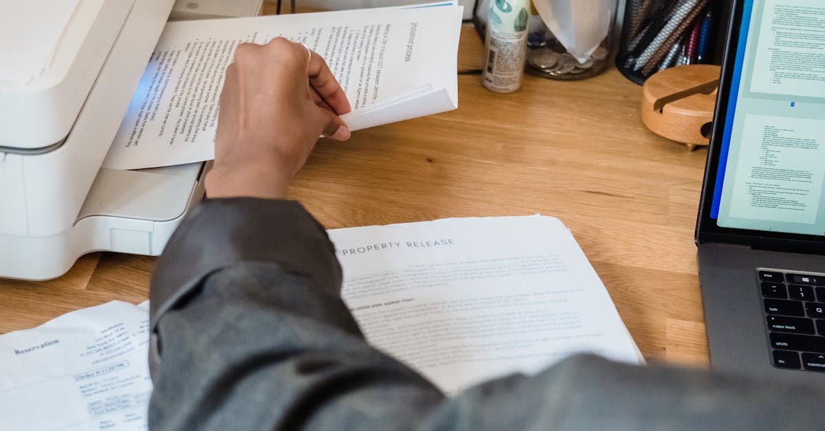 Printing Documents in Close Up · Free Stock Photo