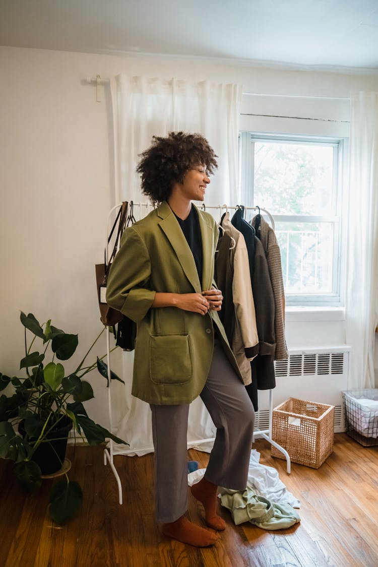 Woman Wearing Coat In Room