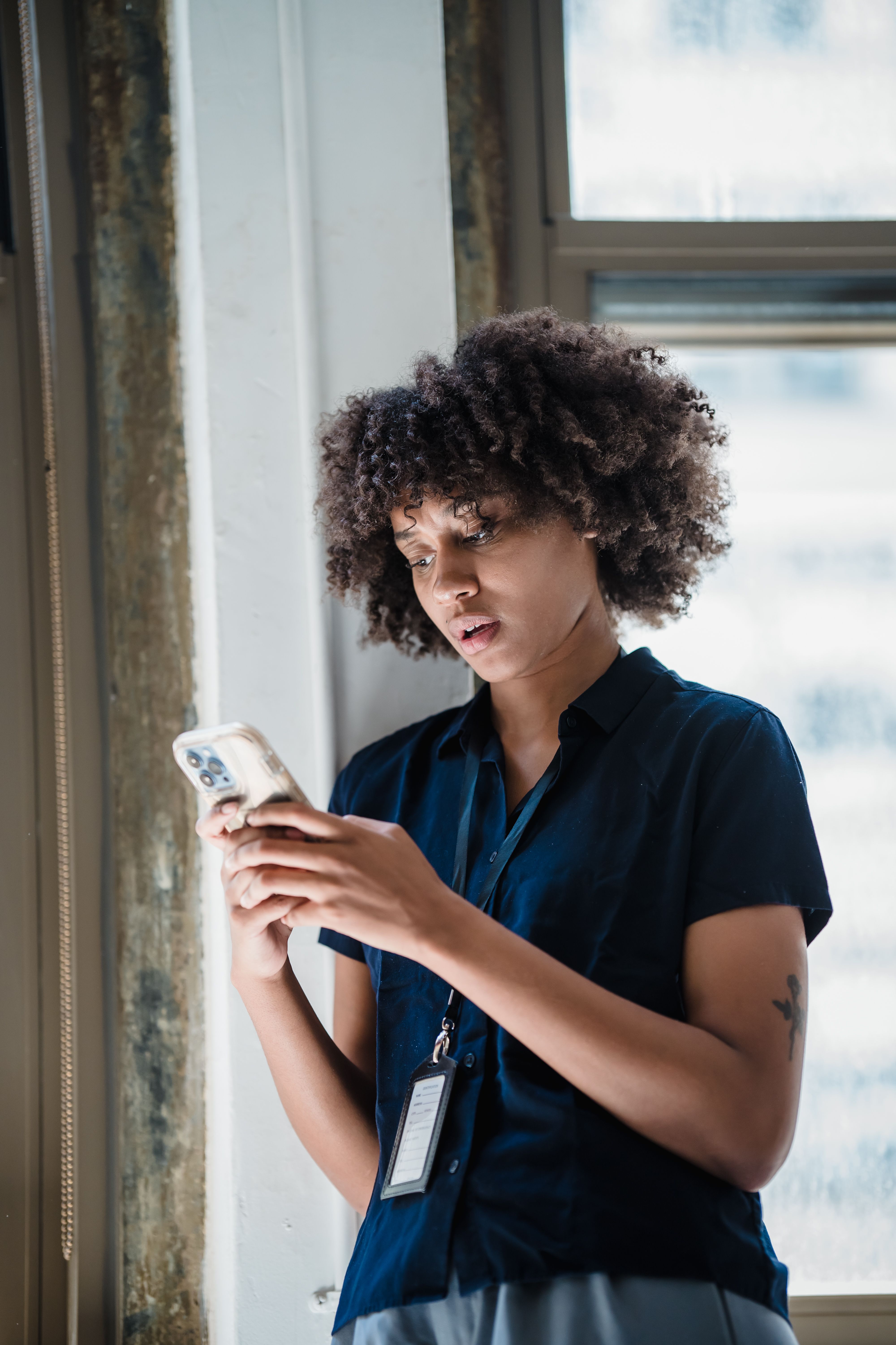 Business owner chatting with AI agent on phone