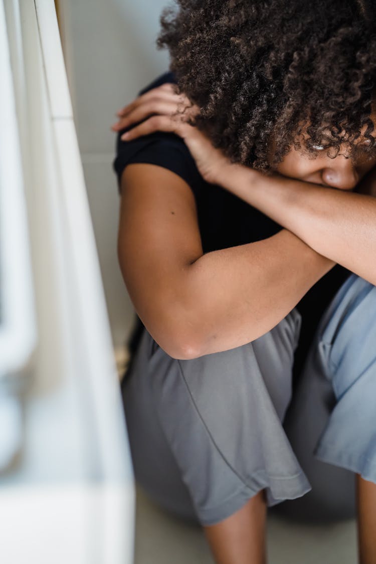 Woman Hiding In Corner