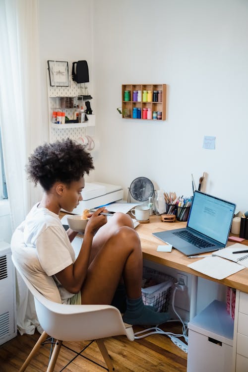 Woman Working on Computer in Home Office