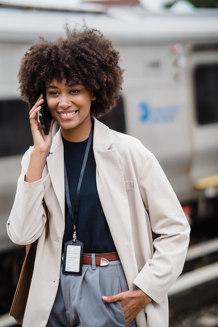 Smiling Woman Talking On Phone