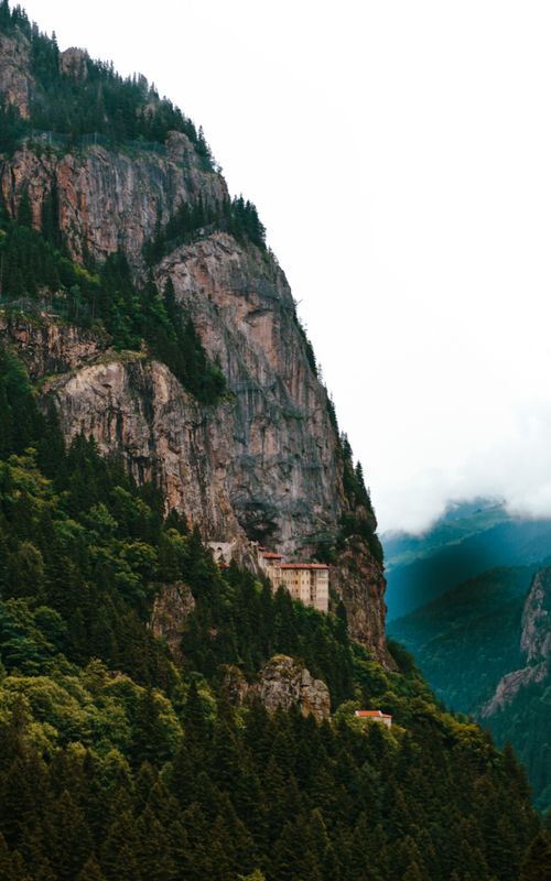 Free Explore the breathtaking view of Sumela Monastery amidst lush forests in Altındere, Trabzon, Türkiye. Stock Photo