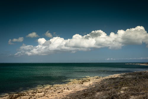 Ücretsiz ada, bulut, dalga içeren Ücretsiz stok fotoğraf Stok Fotoğraflar