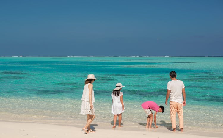 Four People On The Beach