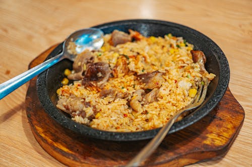 Close-Up Shot of a Delicious Fried Rice with Meat