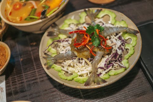 Raw Prawns with Vegetables on Ceramic Plate