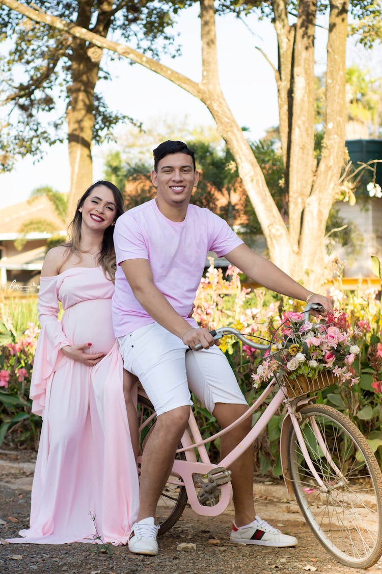 Happy Couple At Pregnancy Outdoor Photo Shoot