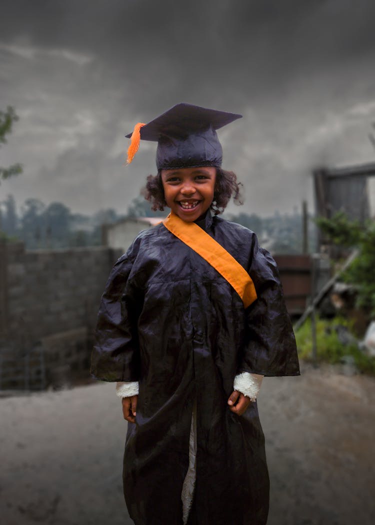 Kid Wearing Graduation Gown