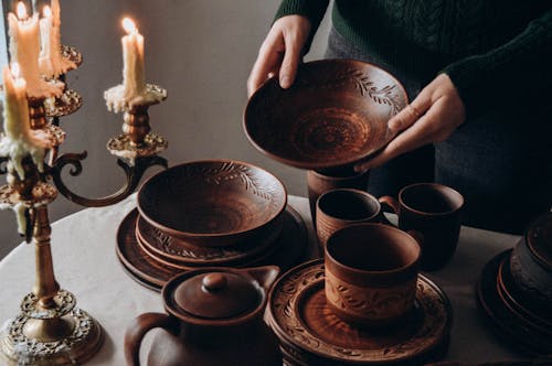 Woman and Traditional Clay Tableware