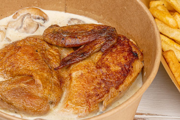 Cooked Chicken On Soup Bowl