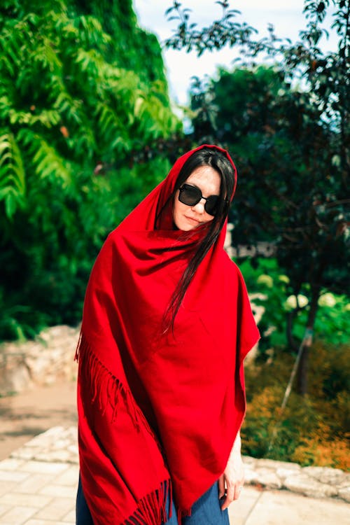Woman in Red Scarf and Black Sunglasses