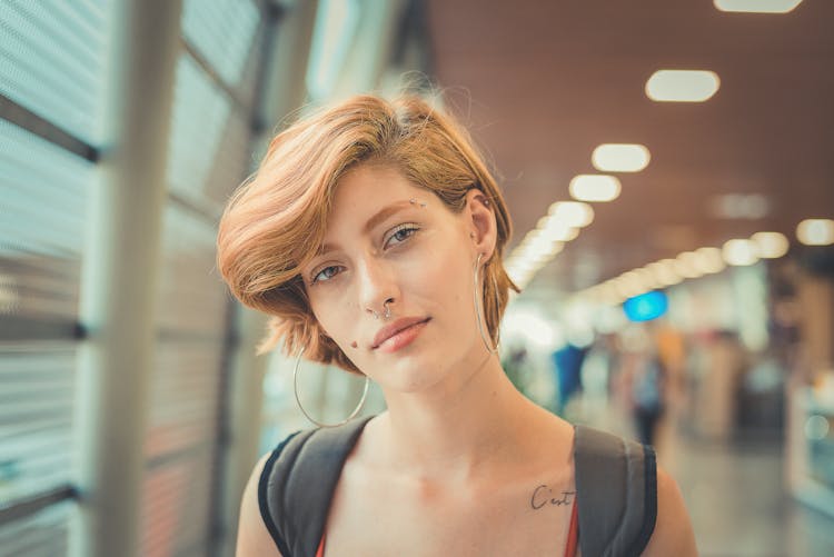 Woman With Short Hair And Piercings